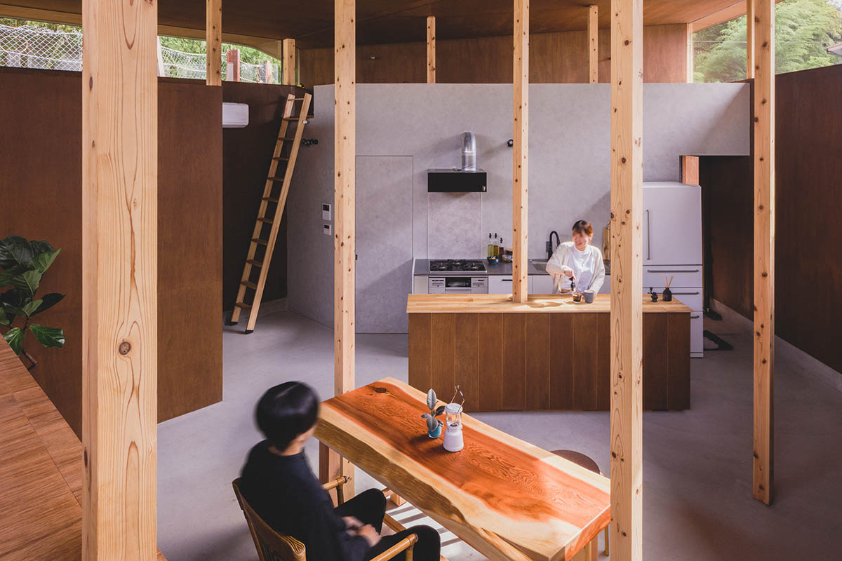 IGArchitects creates two-family house around a forest of wooden pillars in Japan 