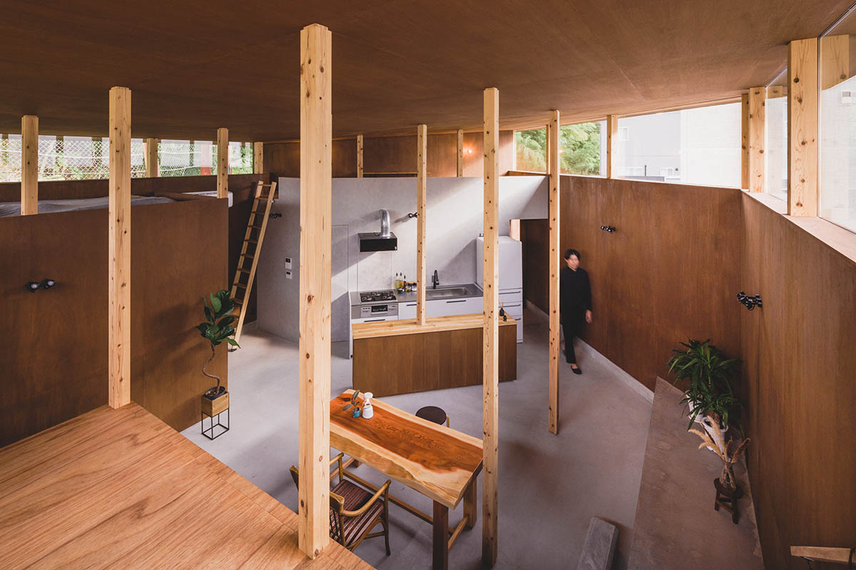IGArchitects creates two-family house around a forest of wooden pillars in Japan 