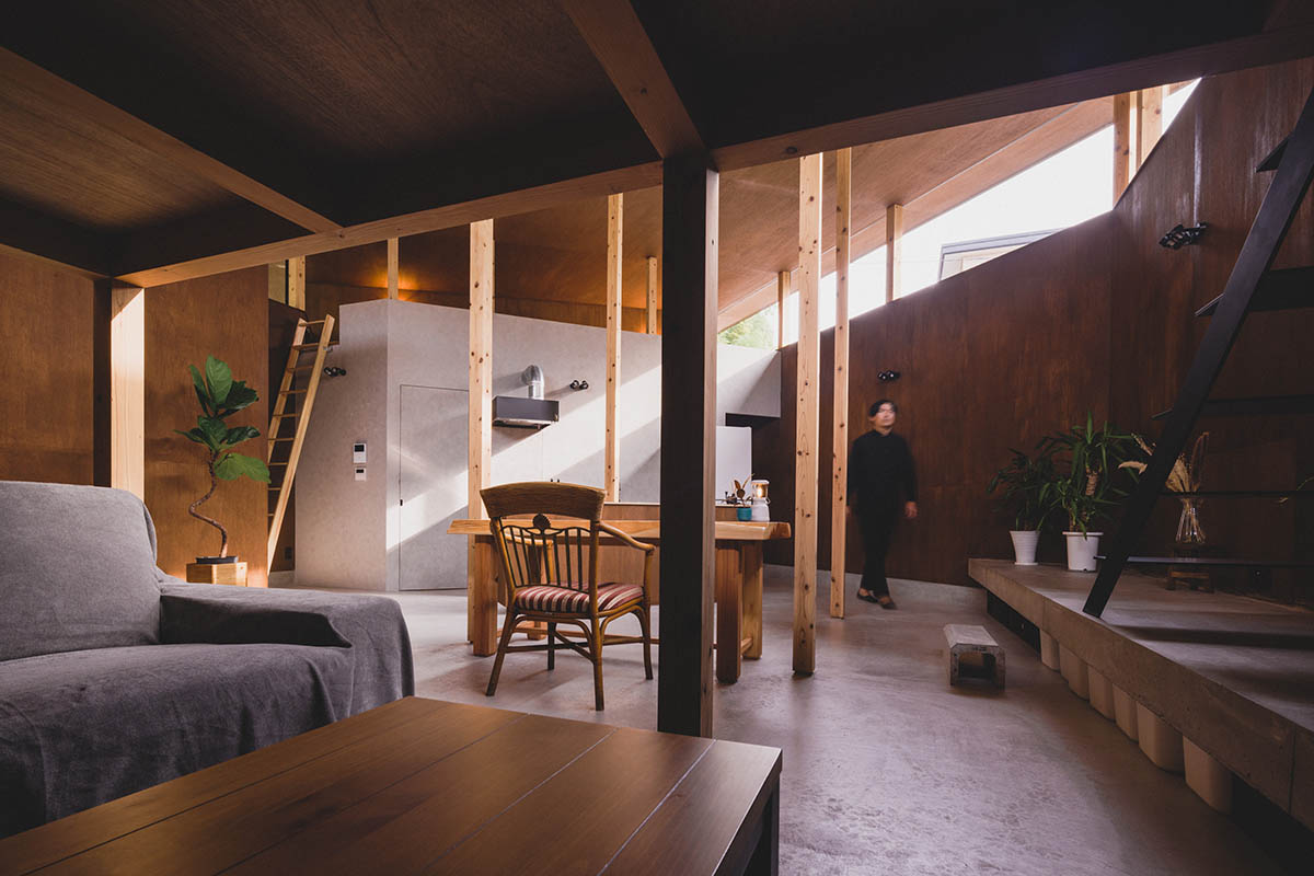 IGArchitects creates two-family house around a forest of wooden pillars in Japan 