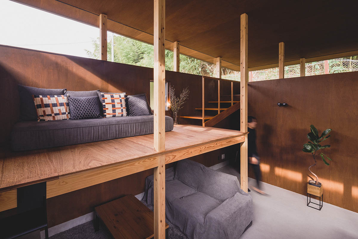 IGArchitects creates two-family house around a forest of wooden pillars in Japan 