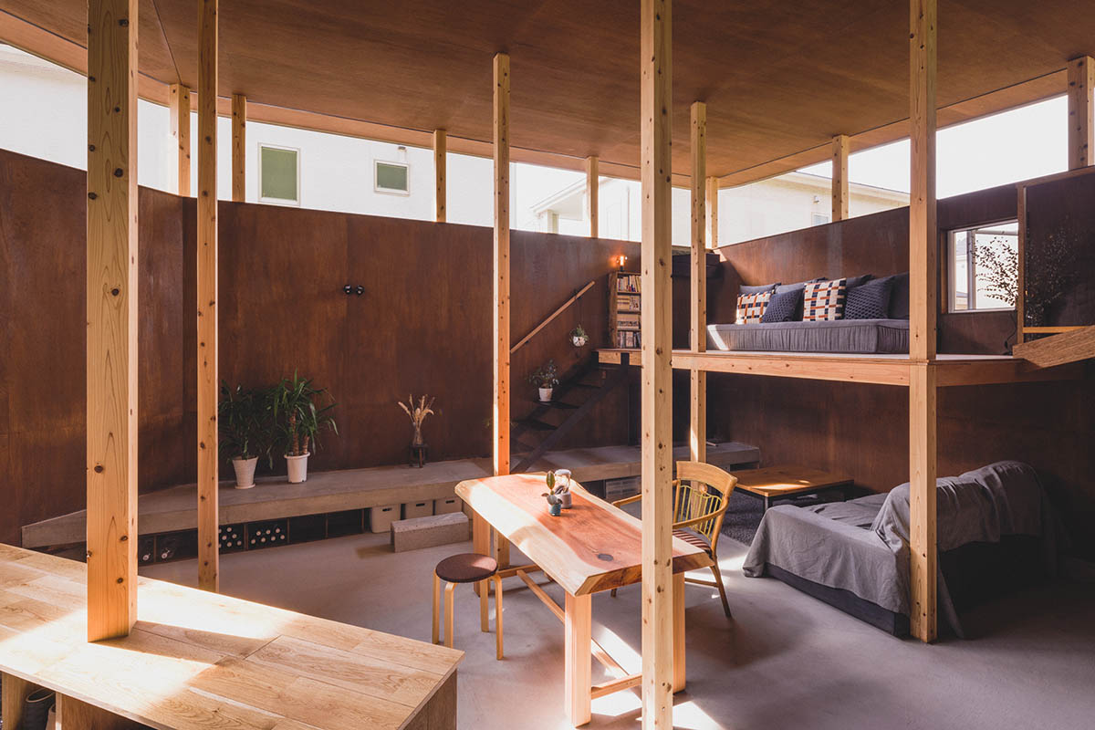 IGArchitects creates two-family house around a forest of wooden pillars in Japan 