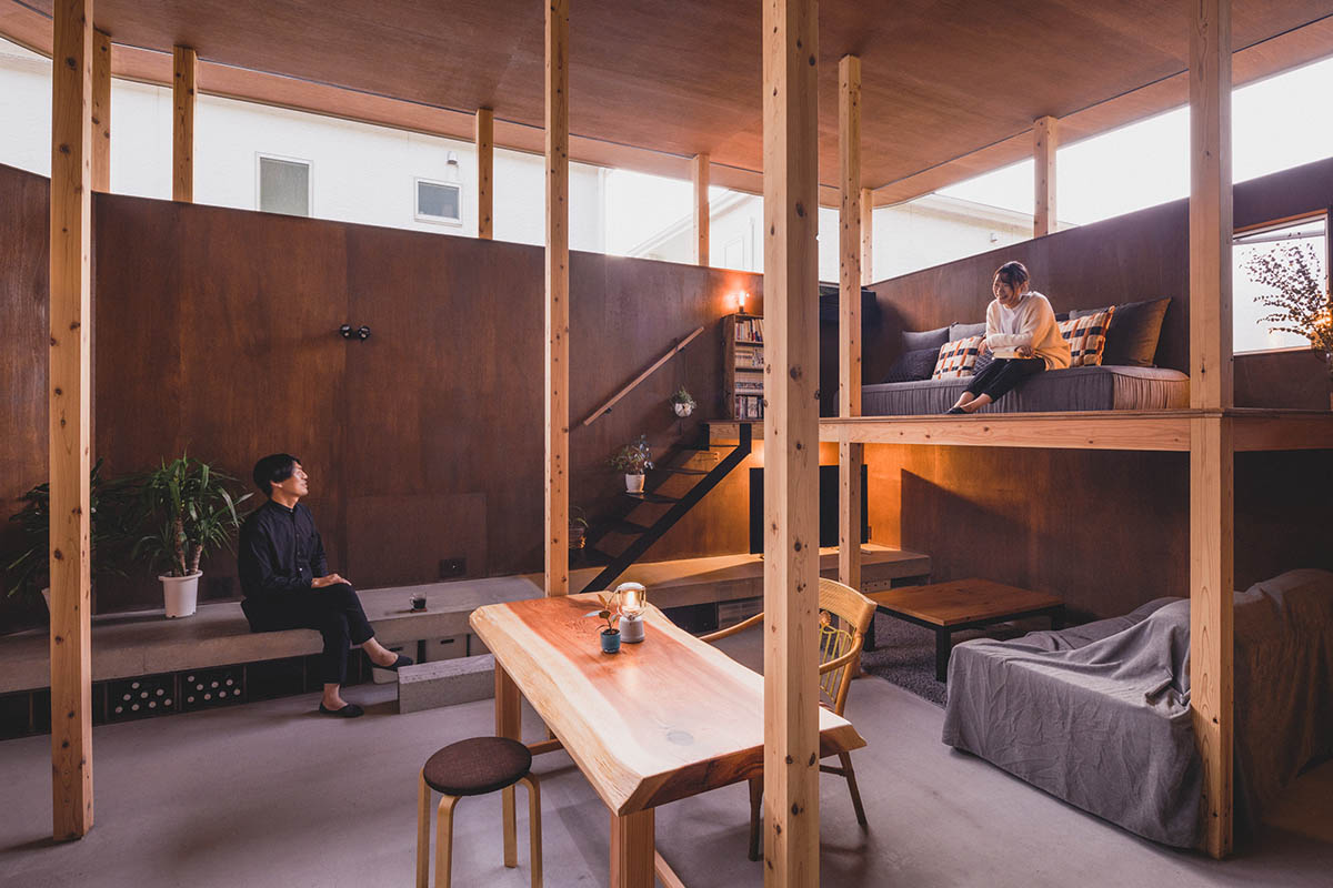 IGArchitects creates two-family house around a forest of wooden pillars in Japan 