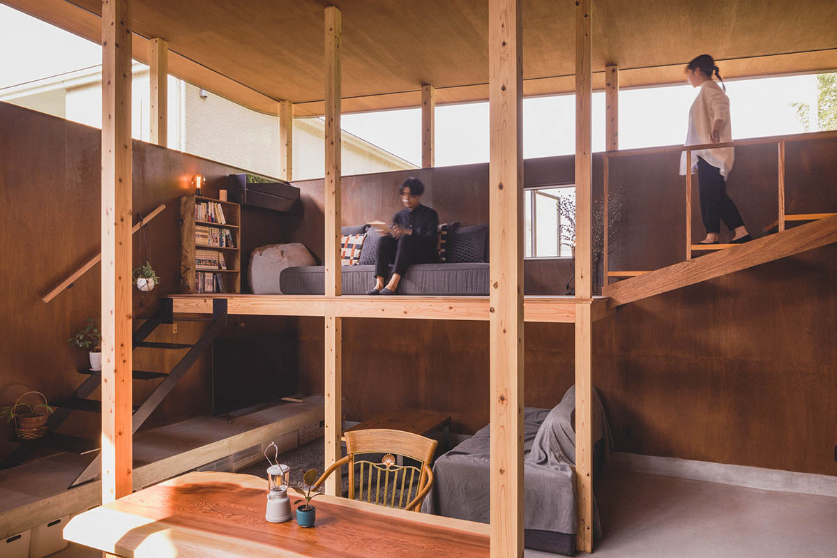 IGArchitects creates two-family house around a forest of wooden pillars in Japan 