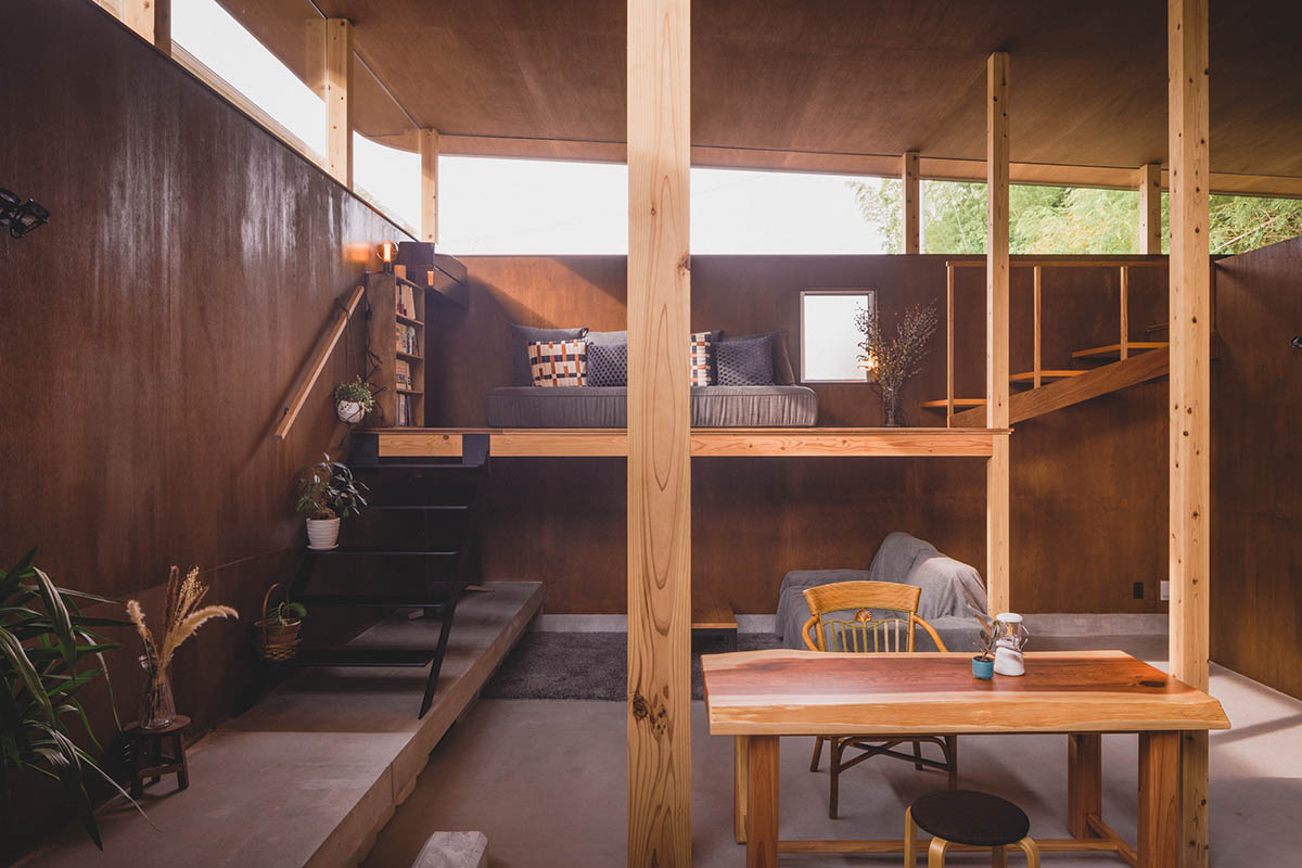 IGArchitects creates two-family house around a forest of wooden pillars in Japan 