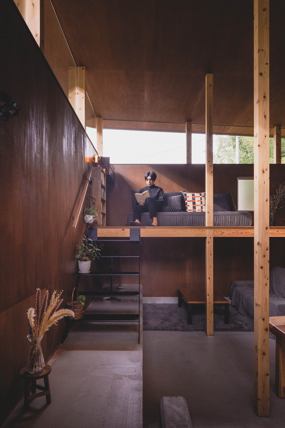 IGArchitects creates two-family house around a forest of wooden pillars in Japan 