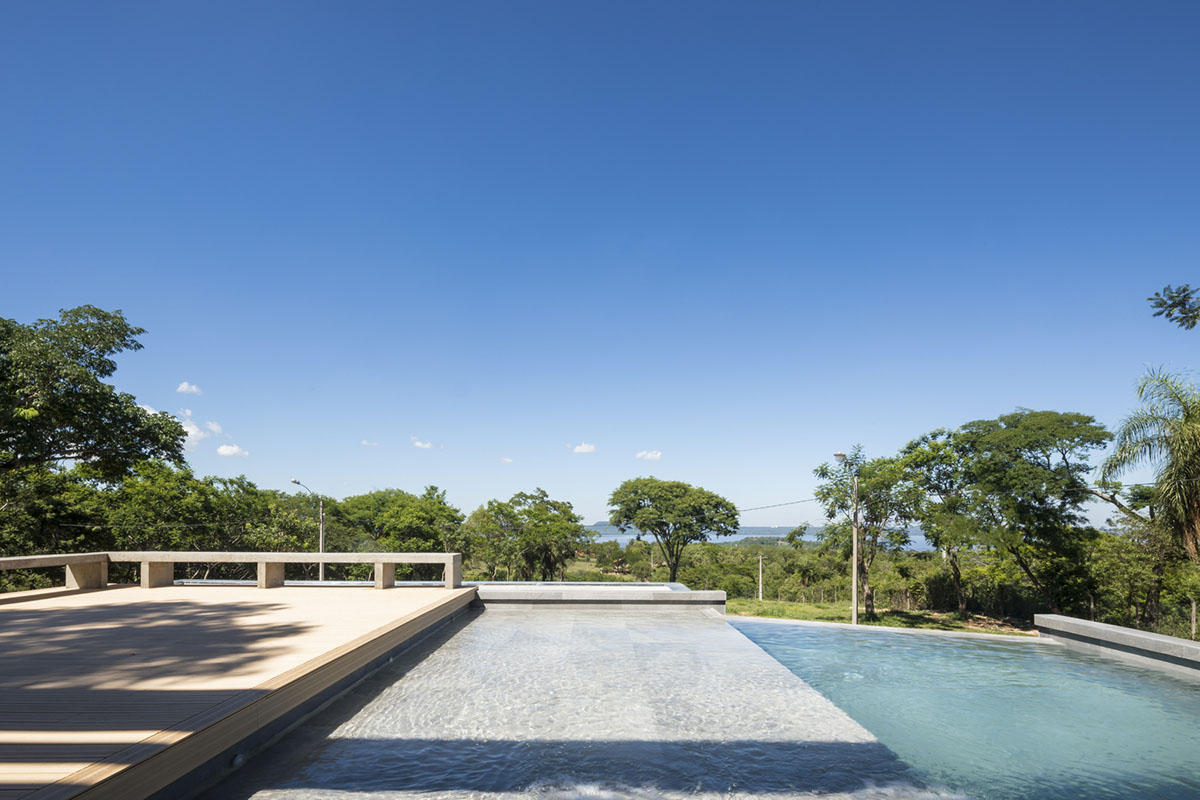 OMCM arquitectos brings rocky landscape inside of this weekend house in Paraguay