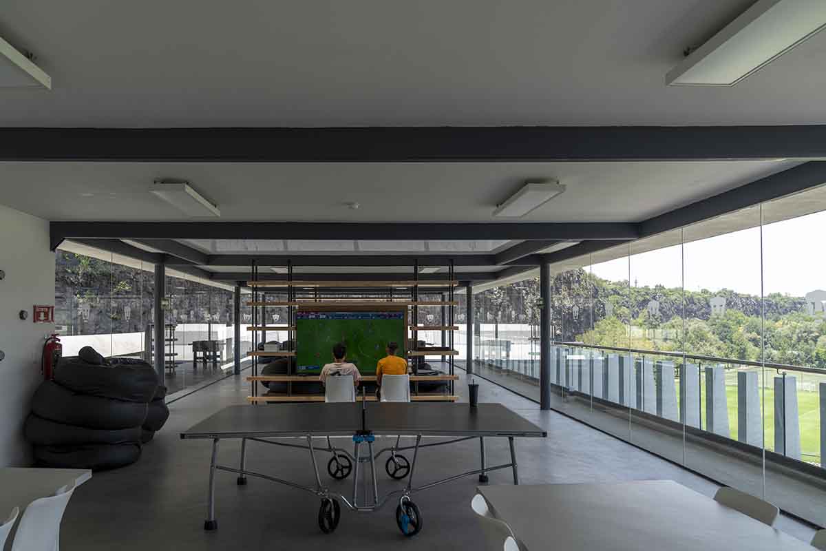 DF Arquitectos completes Pumas Clubhouse from volcanic stone in Mexico