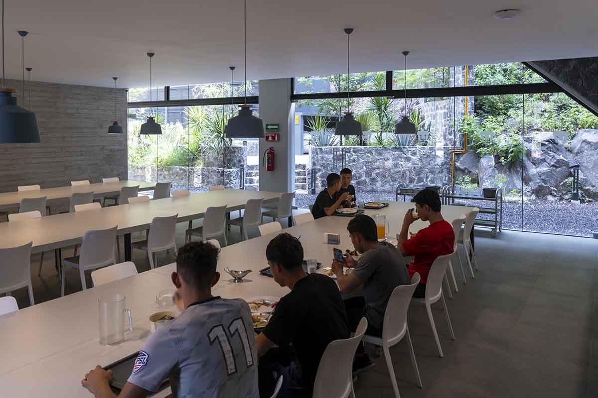 DF Arquitectos completes Pumas Clubhouse from volcanic stone in Mexico