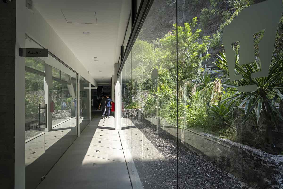 DF Arquitectos completes Pumas Clubhouse from volcanic stone in Mexico