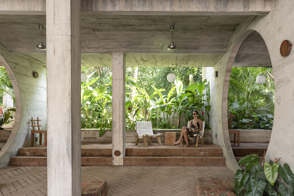 Casa TO by Ludwig Godefroy features an island of stairs and vaulted volumes to create discreet oasis