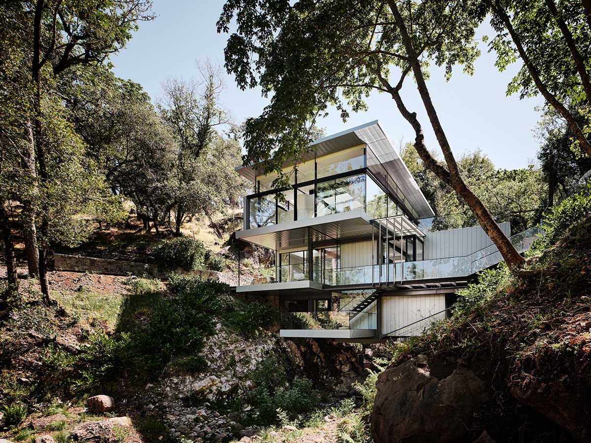 Fougeron Architecture suspends fully glazed house on a creek in California hills