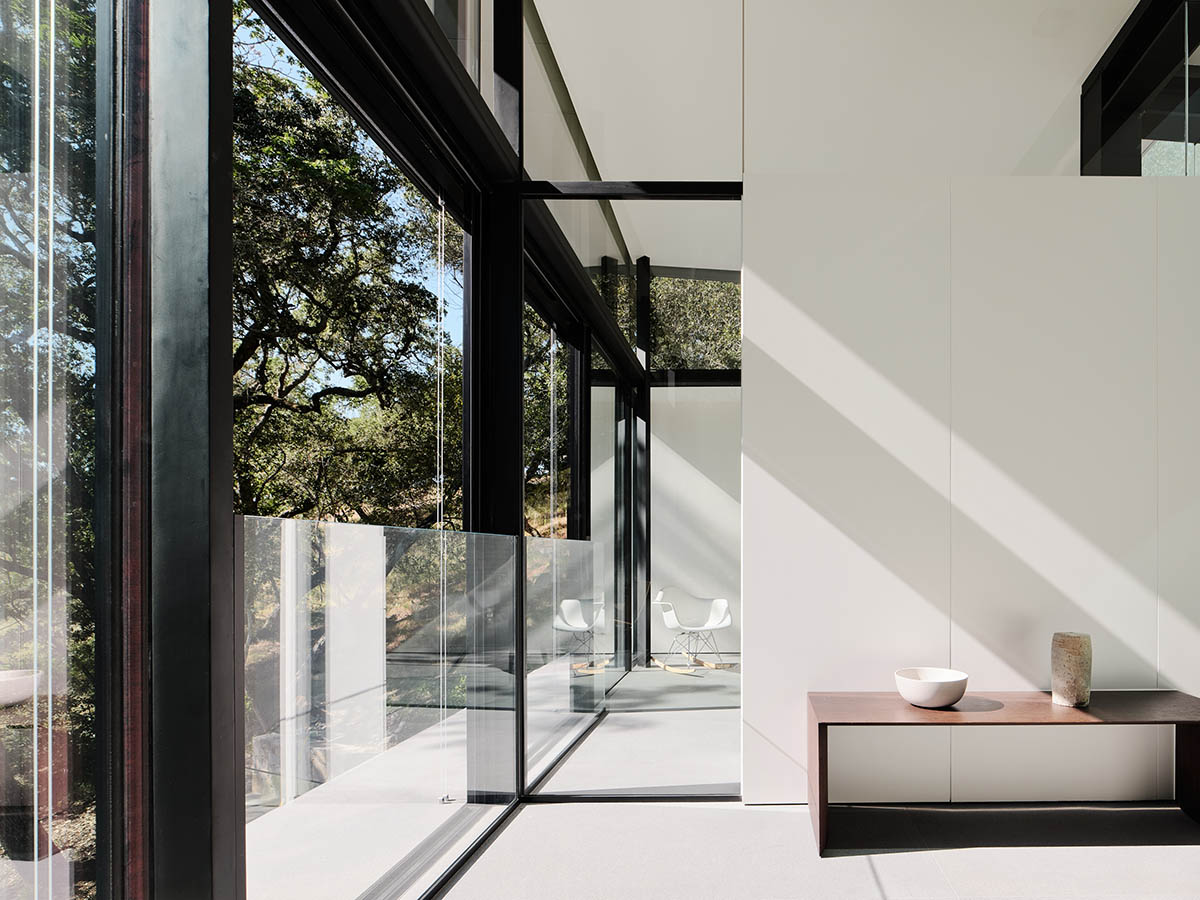 Fougeron Architecture suspends fully glazed house on a creek in California hills