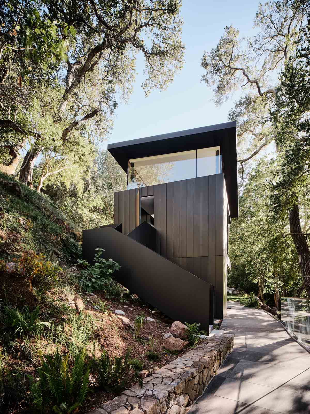 Fougeron Architecture suspends fully glazed house on a creek in California hills