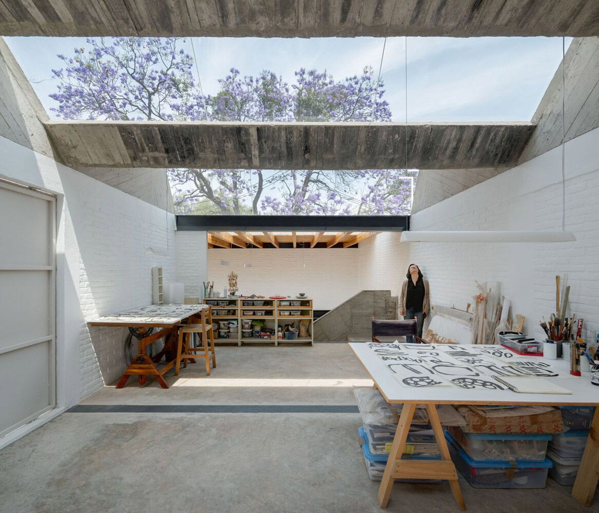 Sculptor's home studio features industrial saw-tooth roofs creating  breathing interiors in Mexico