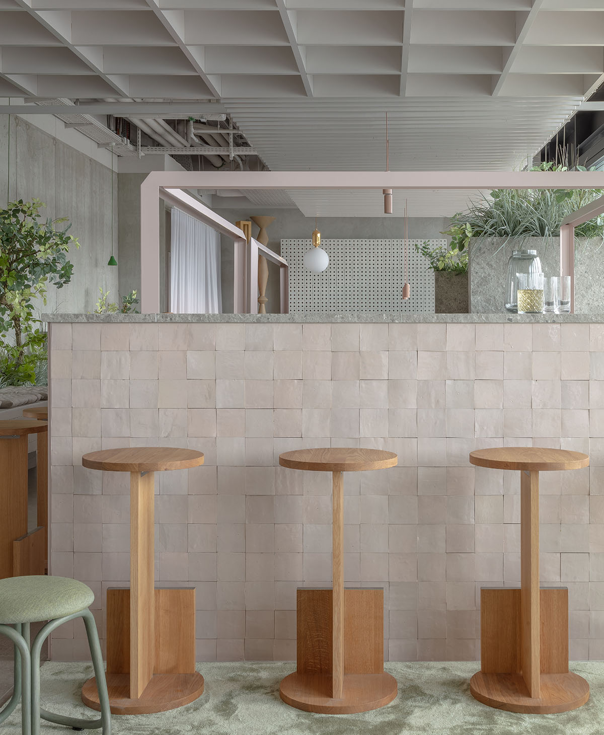 Hotel interior by Grzywinski + Pons creates order in chaos with objects, materials, and furnitures