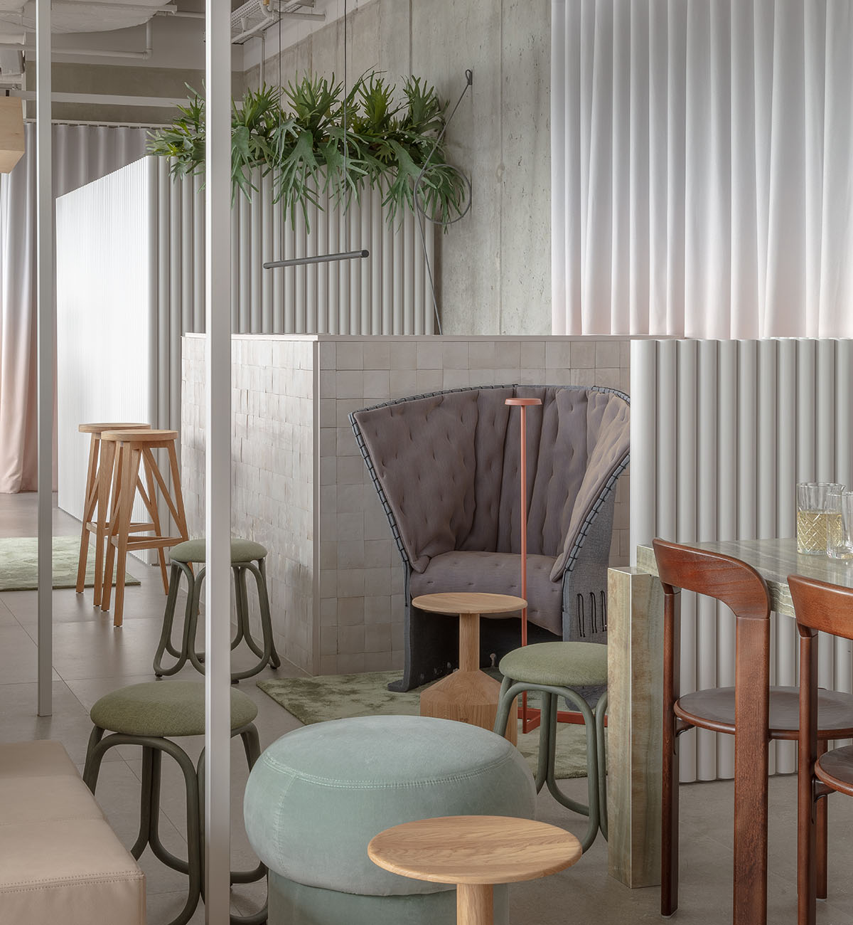Hotel interior by Grzywinski + Pons creates order in chaos with objects, materials, and furnitures