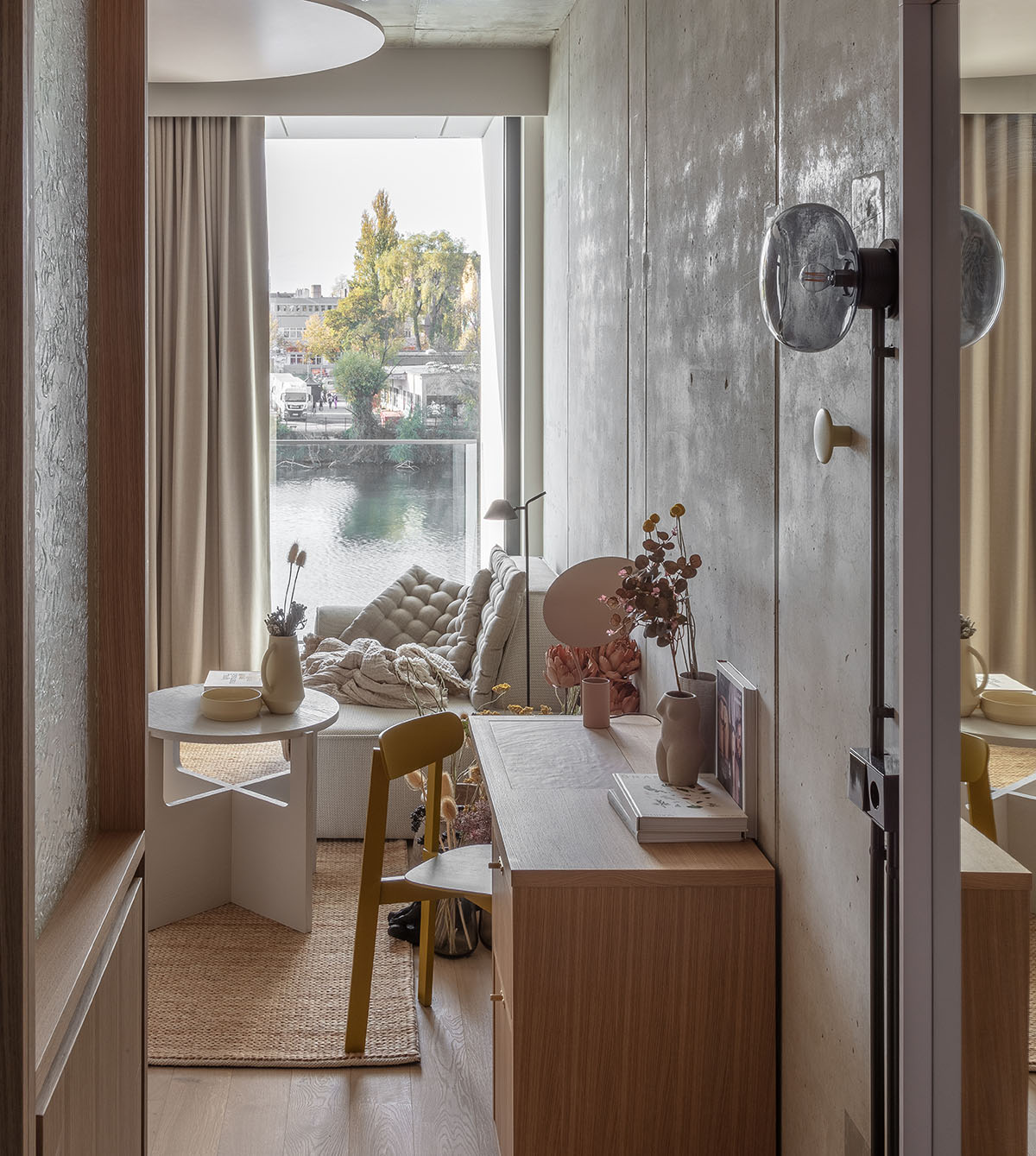 Hotel interior by Grzywinski + Pons creates order in chaos with objects, materials, and furnitures