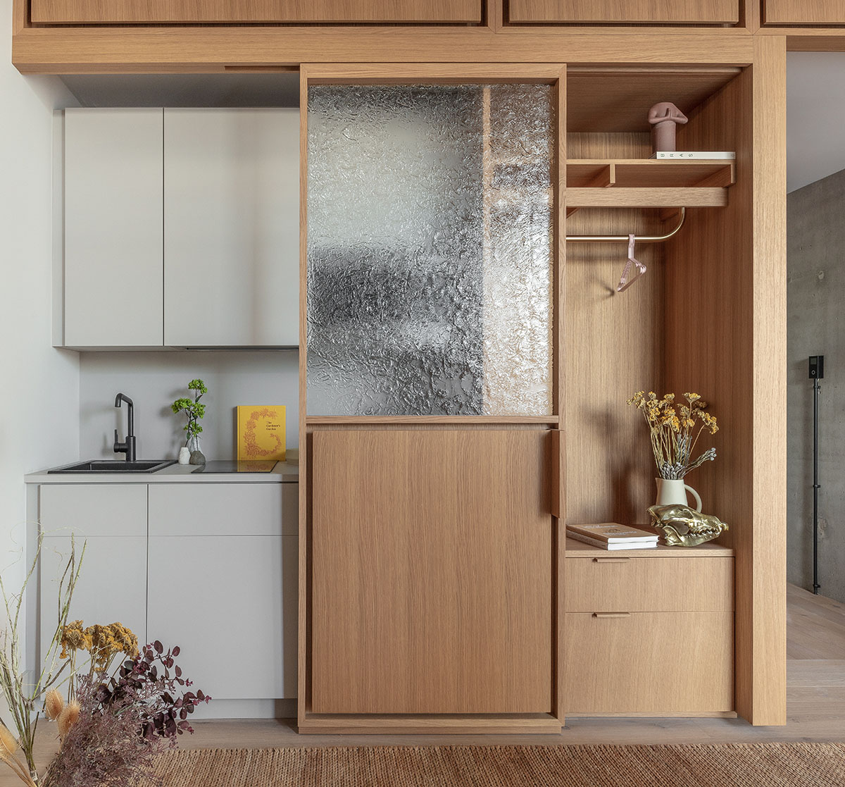 Hotel interior by Grzywinski + Pons creates order in chaos with objects, materials, and furnitures