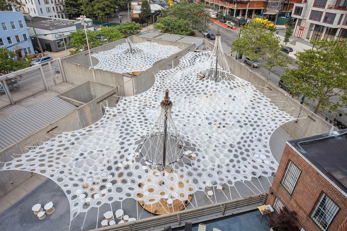 Jenny Sabin Studio&rsquo;s cellular Lumen fabric wraps MoMA PS1&rsquo;s courtyard in NY