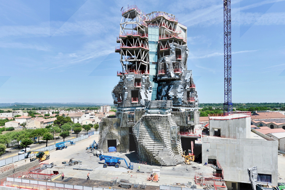 Construction photographs revealed for Frank Gehry’s mountainous stainless steel tower at LUMA Arles