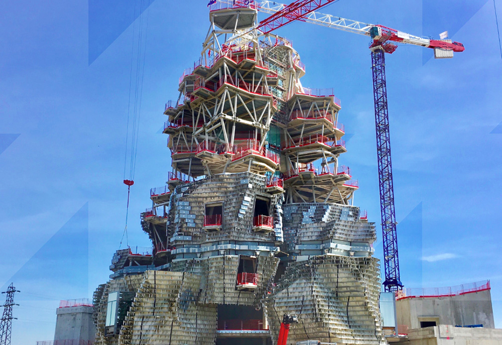 Construction photographs revealed for Frank Gehry’s mountainous stainless steel tower at LUMA Arles