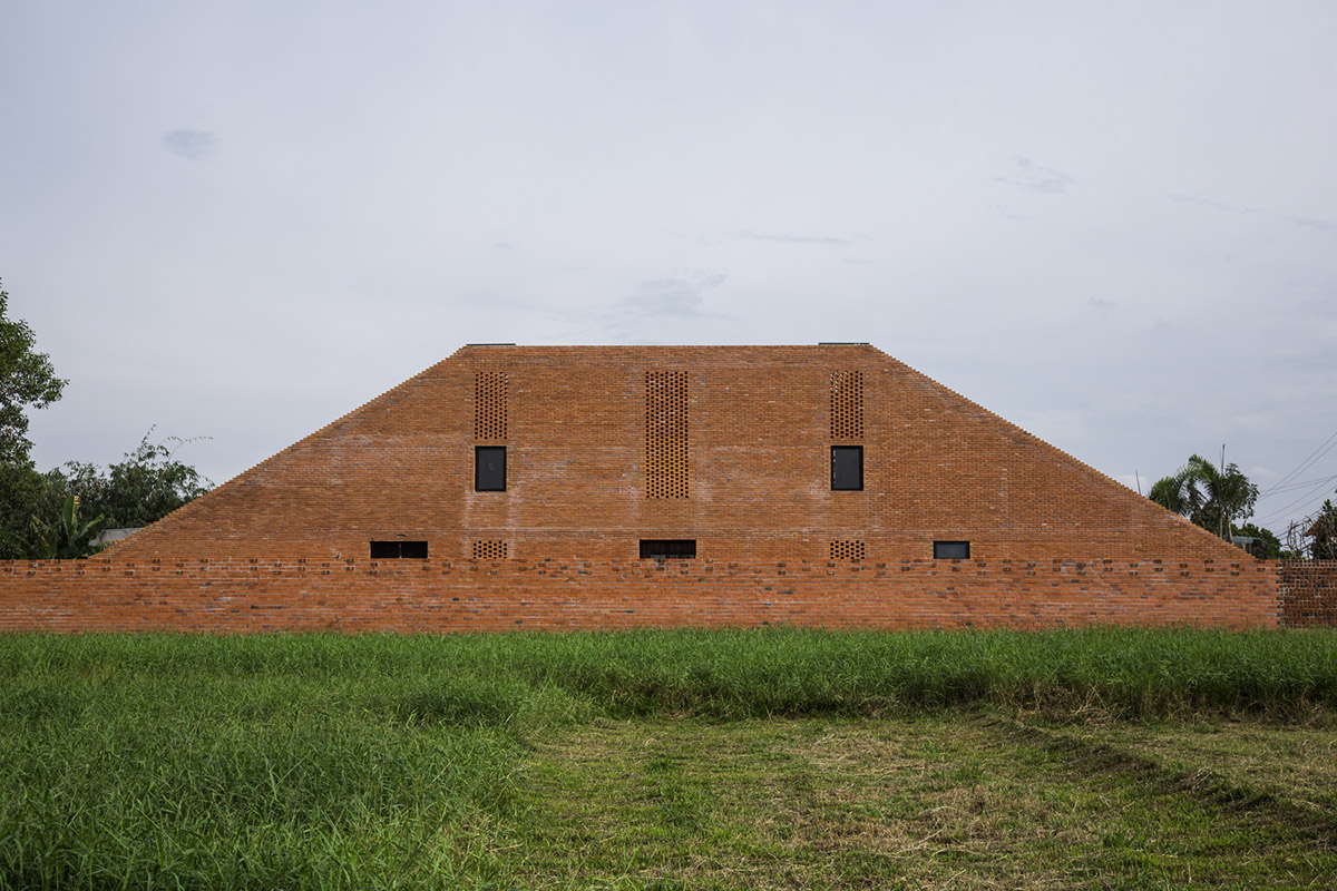 This Innovative Brick House In Vietnam Creates Continuous Internal Spaces