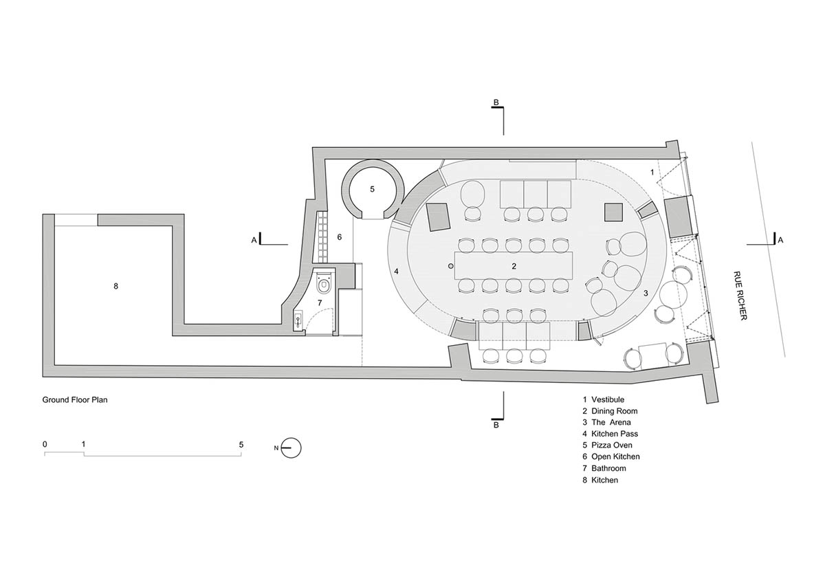Neri&Hu-designed restaurant in Paris exposes layering material history with oblong volume inside