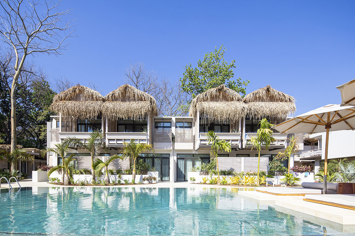 Studio Saxe converts former disused house into a tropical hotel in a ...