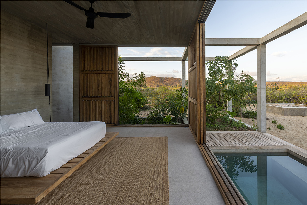 Concrete columns and beams wrap Cosmos House designed by S-AR in Mexico