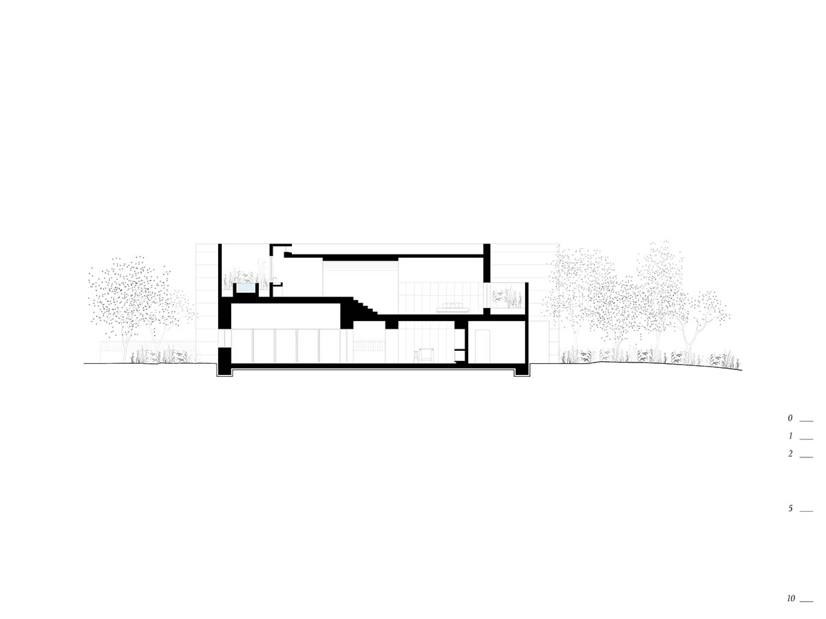 Casa Tejocote features intertwined volumes with pigmented concrete and tepetate colors in Mexico