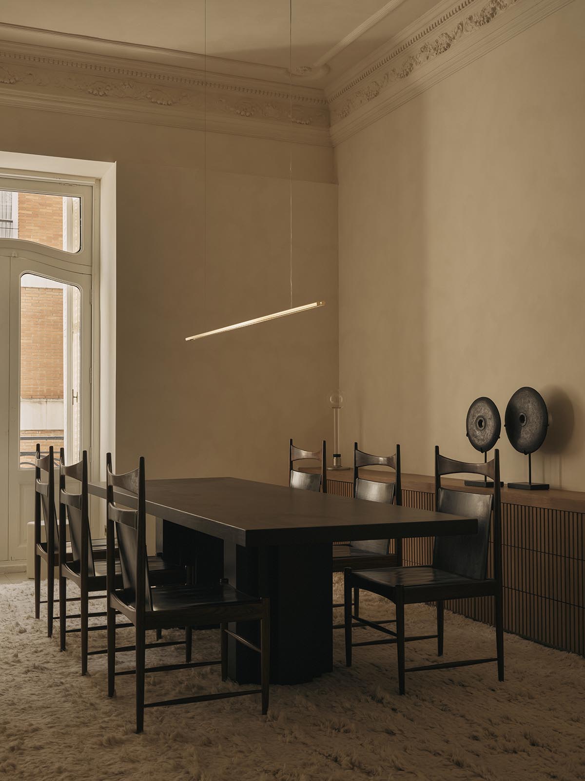 Balzar Architects complete interiors for GE Apartment with a wabi-sabi aesthetic in Valencia