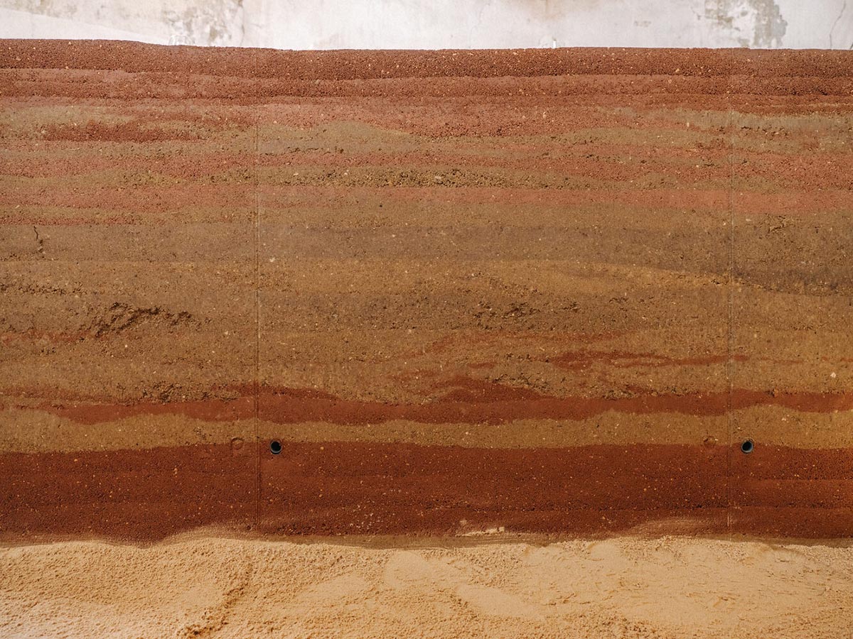 studio Kuidas.works creates zero-waste restaurant in Estonia with a 15-ton rammed-earth table