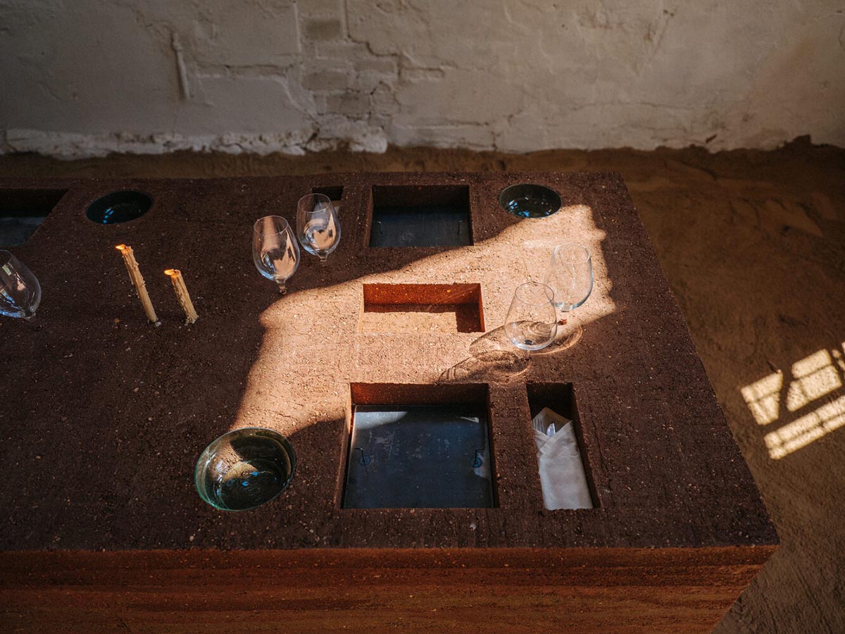 studio Kuidas.works creates zero-waste restaurant in Estonia with a 15-ton rammed-earth table