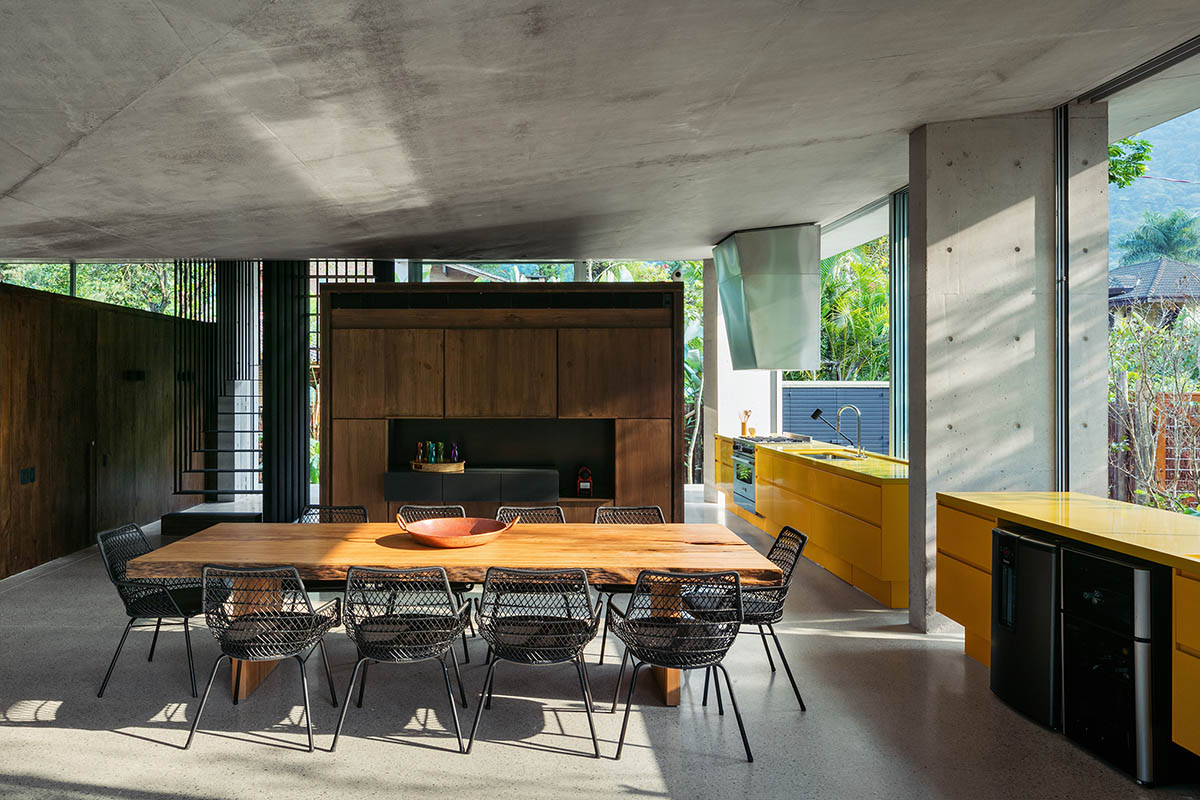 Gui Mattos created open plan for this concrete house to become a part ...