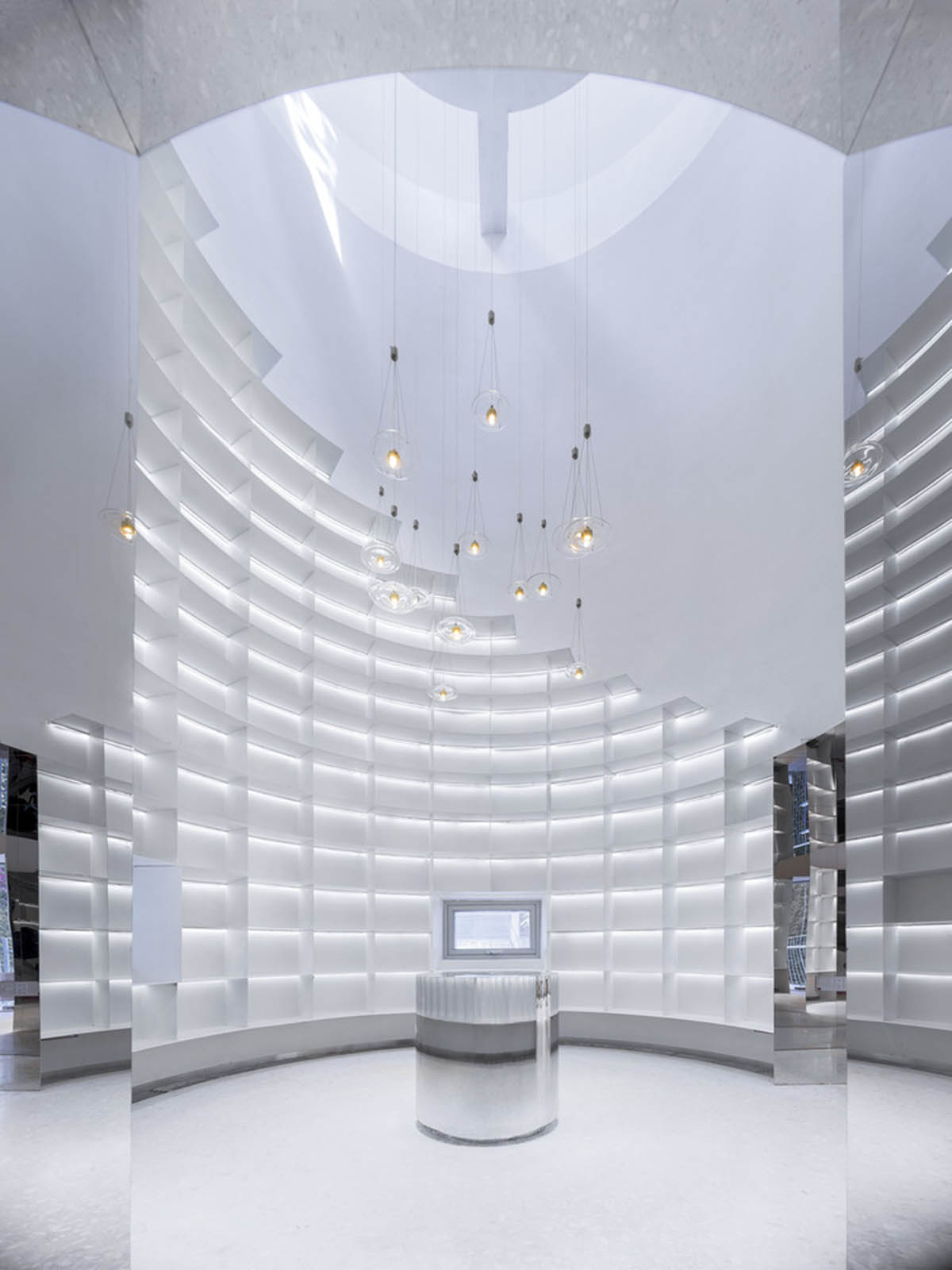 Ten towering cylindrical cement silos are converted to house immersive library of books in China