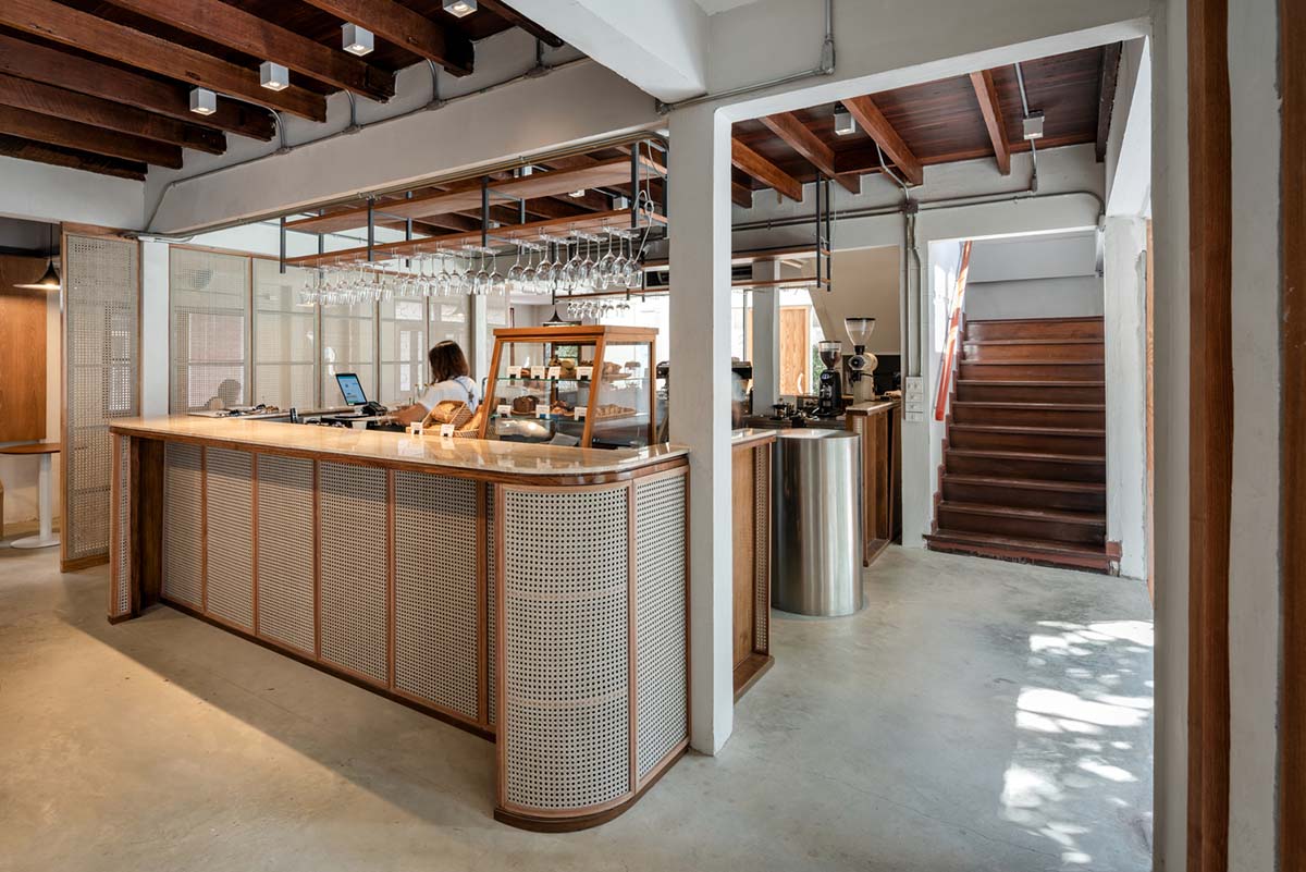 PHTAA Living Design converts old Bangkok house into a restaurant by keeping domestic feeling