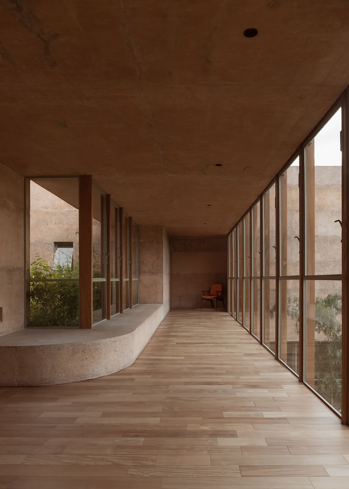 Casa Tejocote features intertwined volumes with pigmented concrete and tepetate colors in Mexico