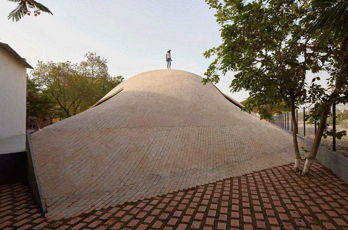 Sameep Padora & Associates built this children's library with curved brick roof in Maharashtra