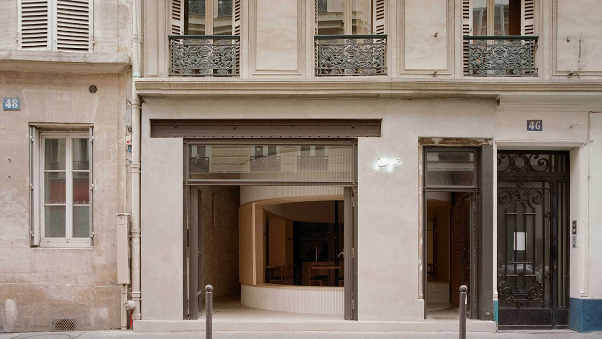 Neri&Hu-designed restaurant in Paris exposes layering material history with oblong volume inside