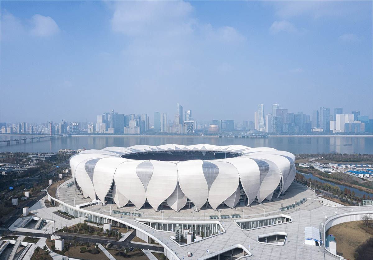 NBBJ forms sustainable olympic sports center inspired by lotus flower