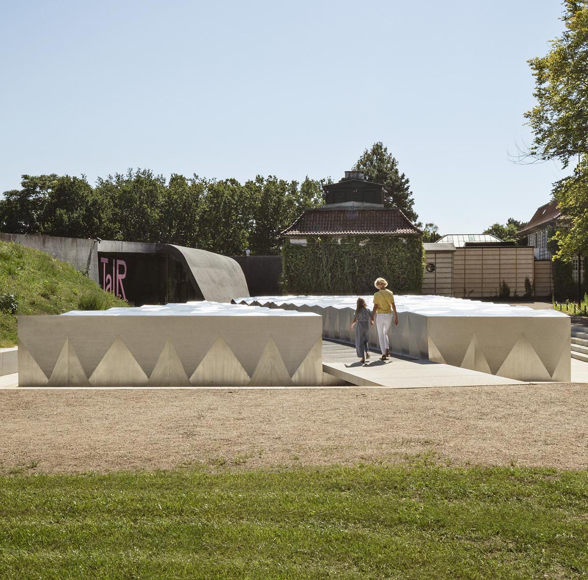 Snøhetta designs subterranean museum extension glistening in landscape for Ordrupgaard Museum