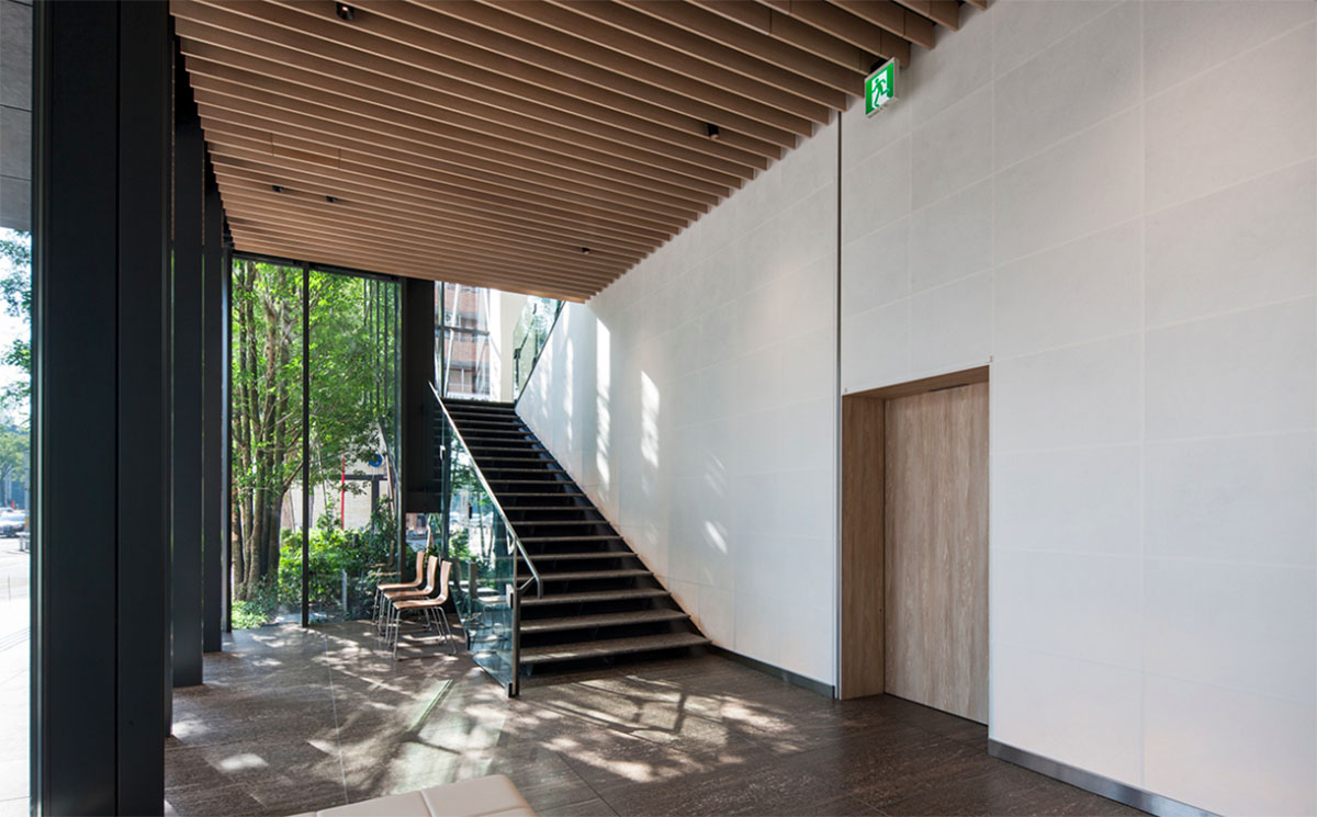 Kengo Kuma wraps office building with wooden lattice in Japan