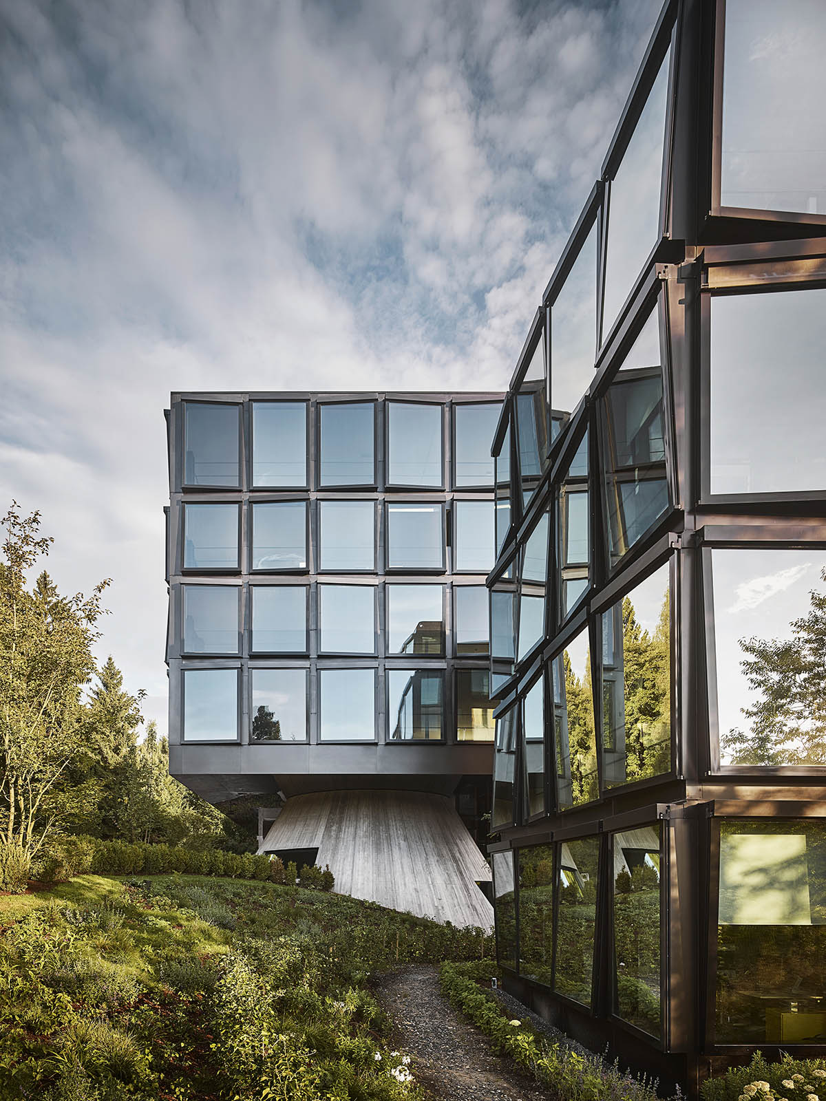 Herzog & de Meuron completes mirror pixelated buildings for Helvetia's new  West Extension