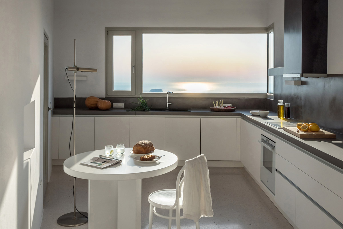 Kapsimalis Architects completes cave-like summer residence on the outskirts of Pyrgos