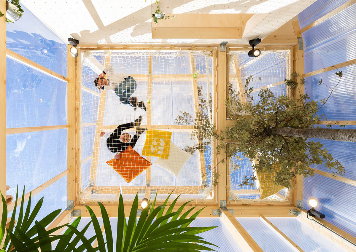 MYCC combines timber and polycarbonate for this multi-floor temporary pavilion in Madrid