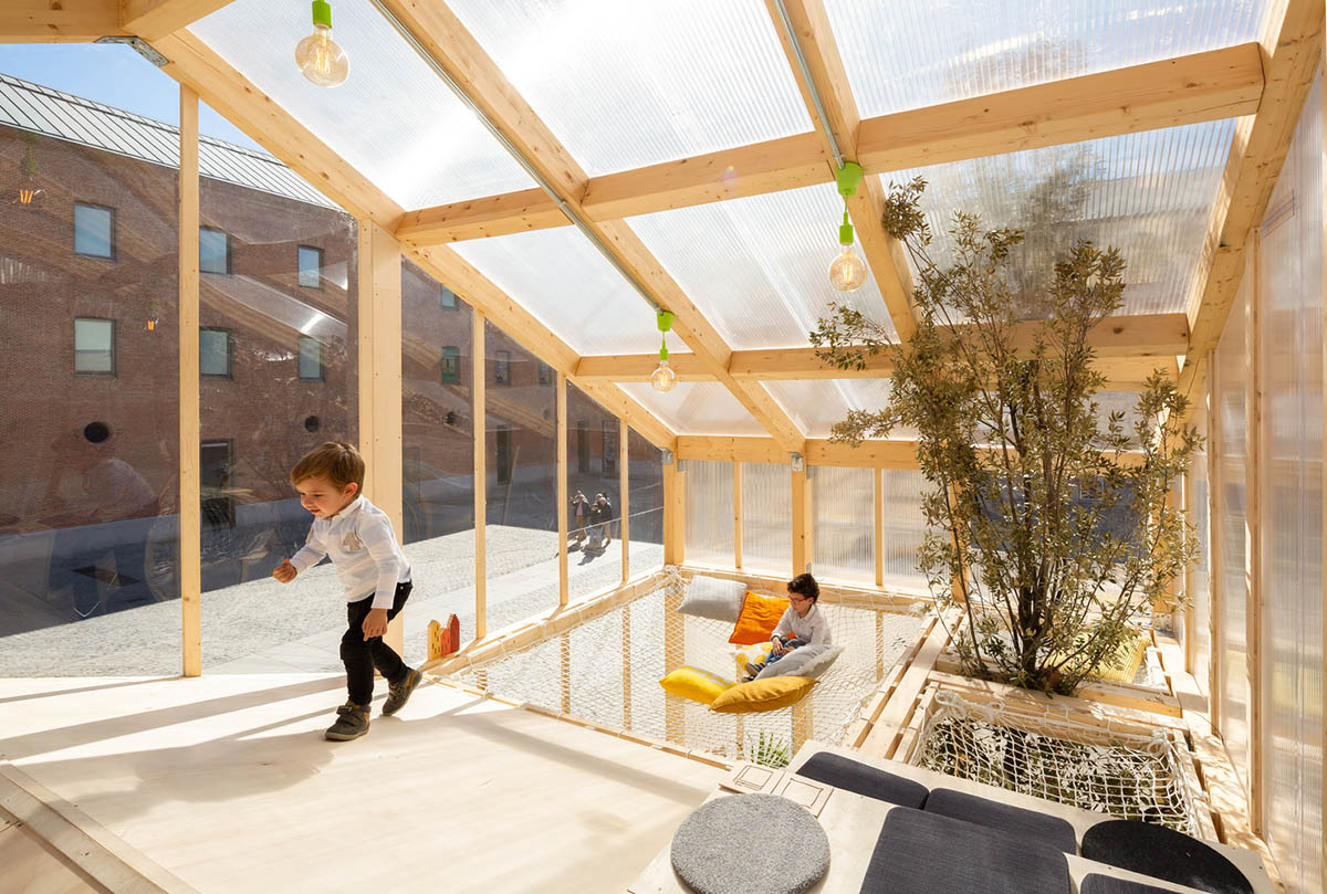 MYCC combines timber and polycarbonate for this multi-floor temporary pavilion in Madrid