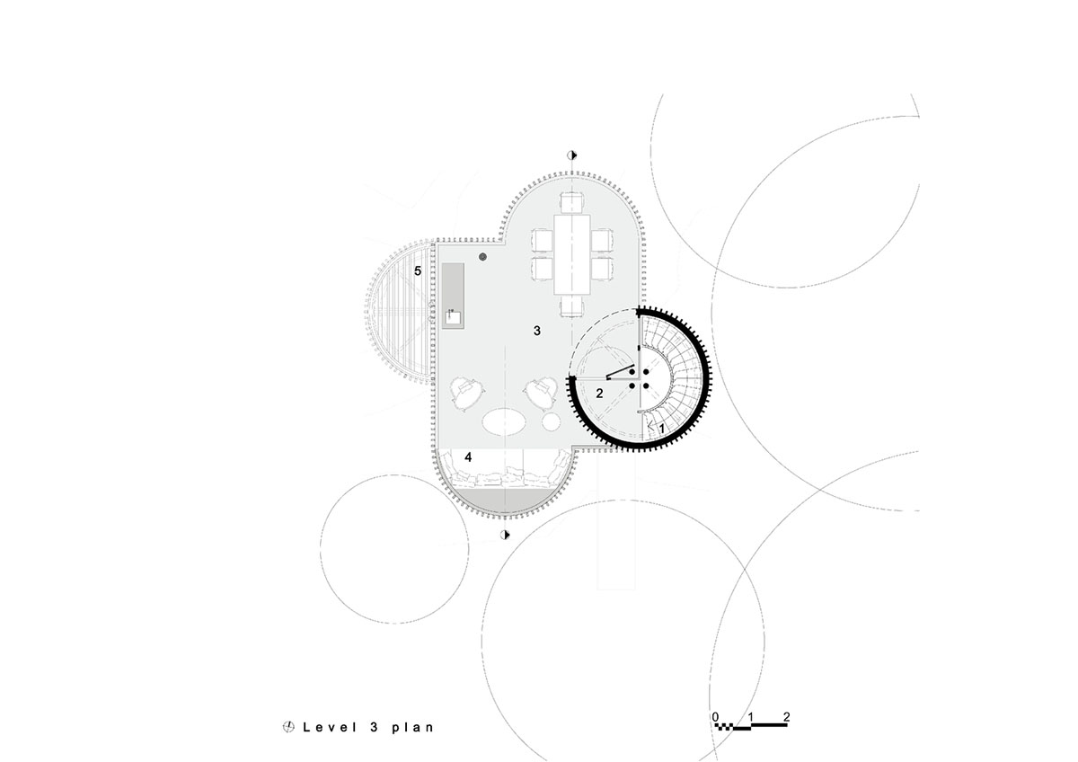 Circular tree house is raised over slender stilts to dominate the forest in every direction