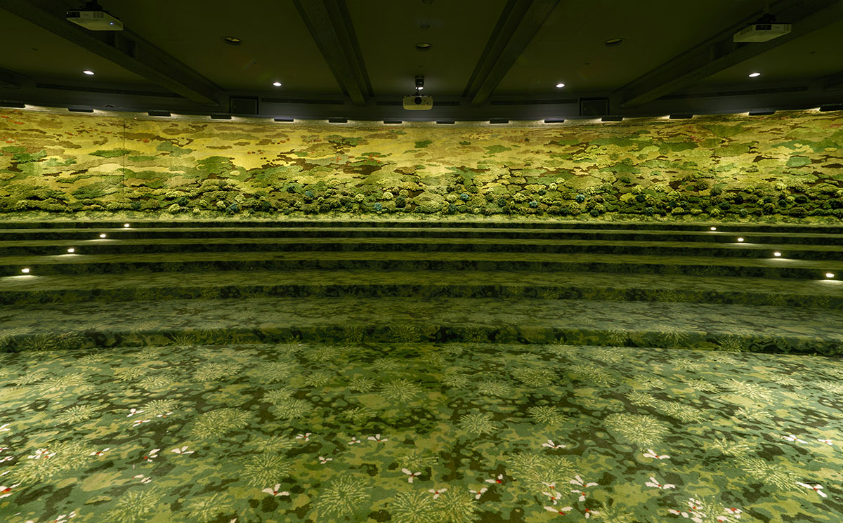 MVRDV and Alexandra Kehagyoglou create continuous green texture for Taipei lecture hall