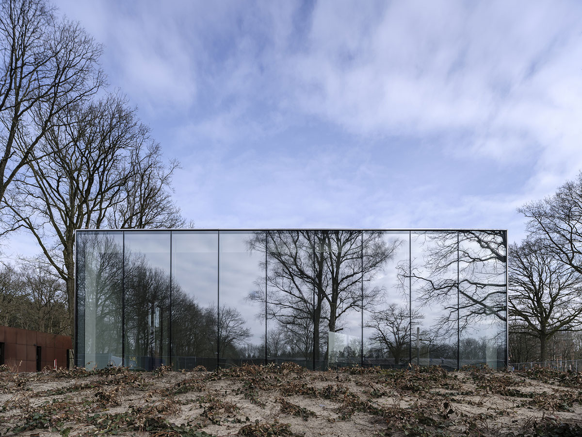 Inbo BV redesigns historic prisoner camp site with reflective pavilion and underground museum
