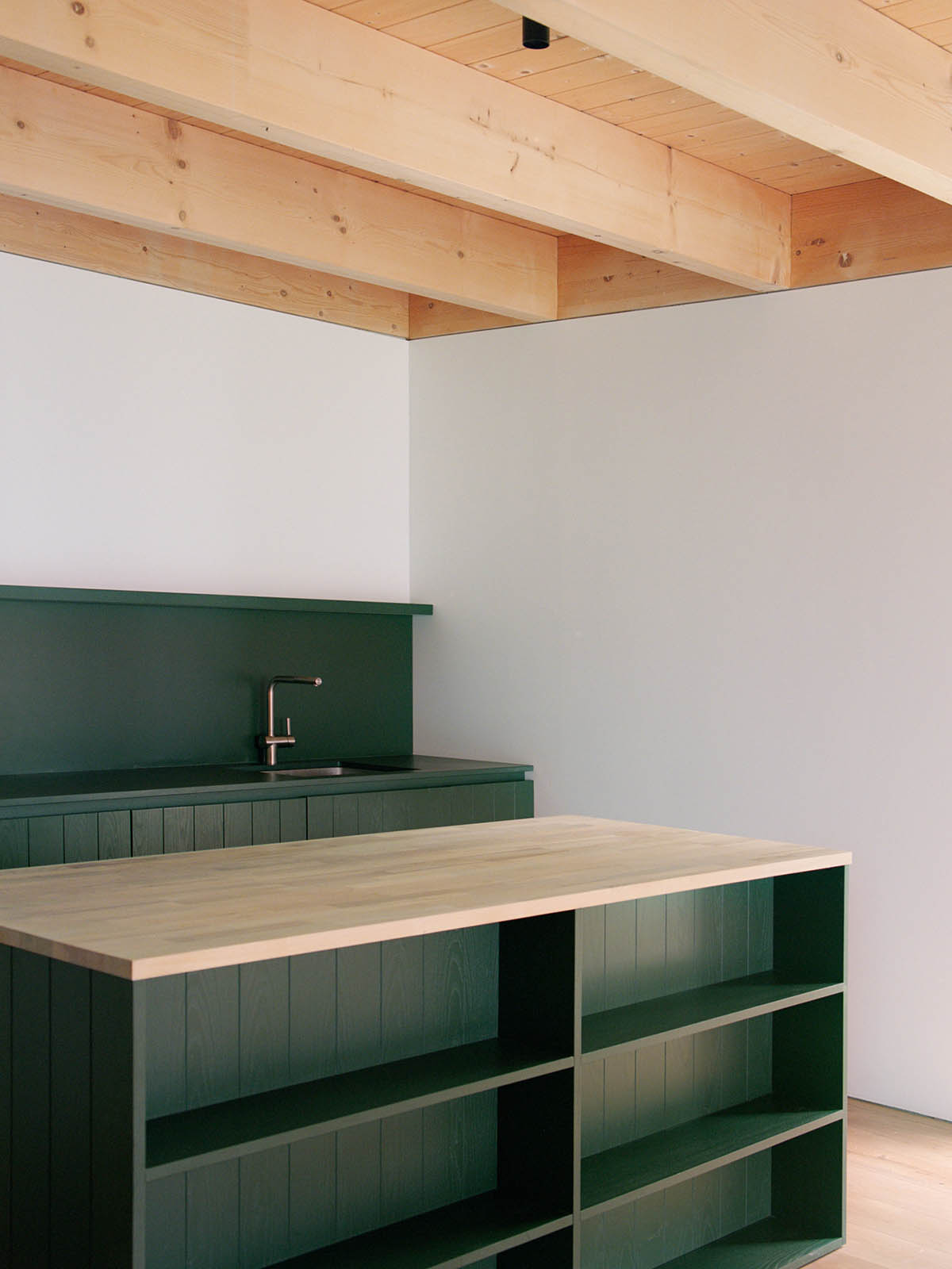 LADO architetti transforms 1970s house into a clean, monochromatic volume in Italy